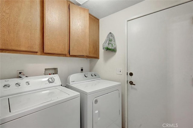 918 Summerfield St, Hemet, CA 92545 - laundry area featuring cabinet space and separate washer and dryer