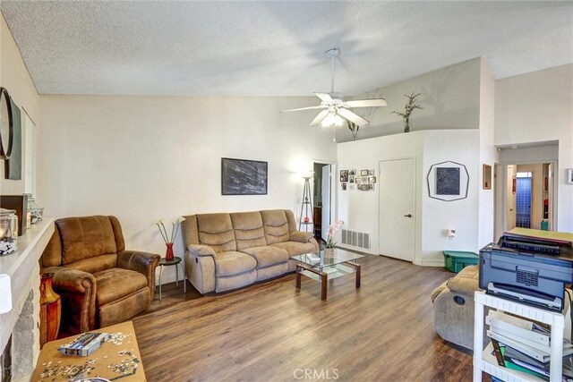 918 Summerfield St, Hemet, CA 92545 - living area with wood finished floors, a ceiling fan, a textured ceiling, and high vaulted ceiling