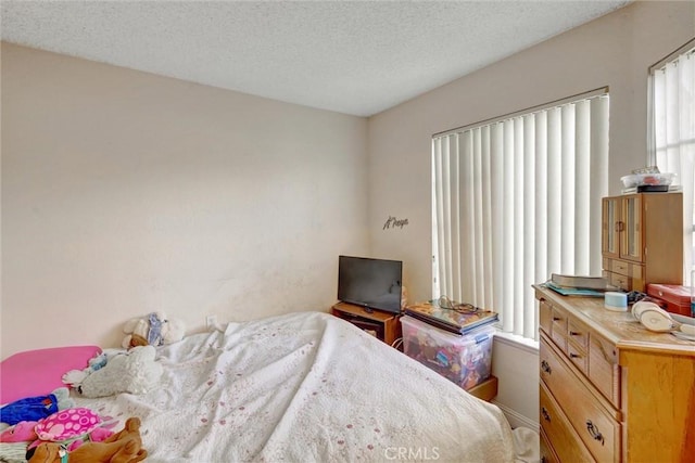 bedroom with a textured ceiling