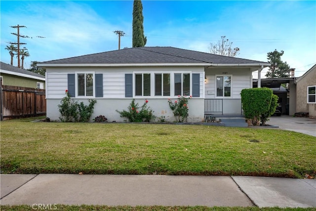 bungalow-style house with a front yard