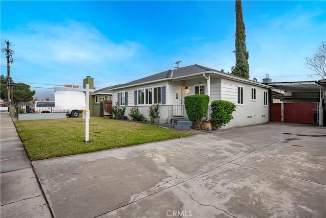 single story home featuring a front yard