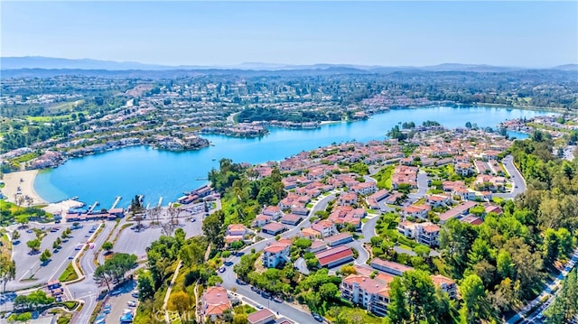 bird's eye view featuring a water and mountain view