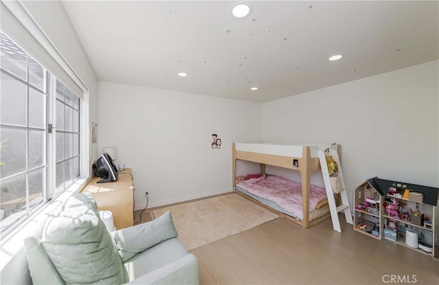 bedroom featuring hardwood / wood-style floors