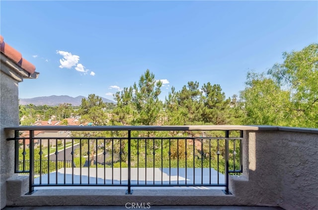 balcony featuring a mountain view