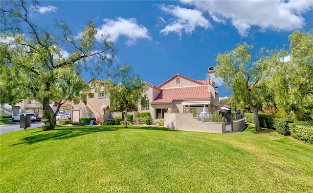 view of front of house with a front lawn and a garage