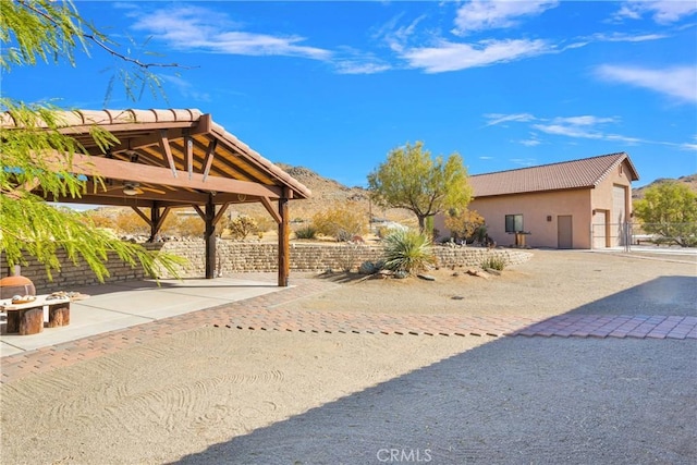 exterior space featuring a mountain view and a gazebo