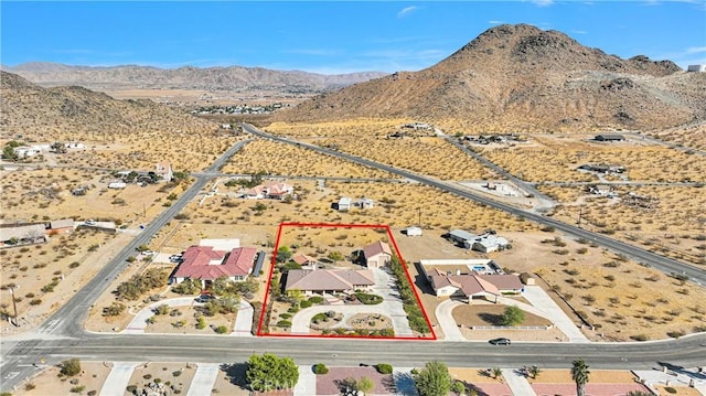 bird's eye view with a mountain view