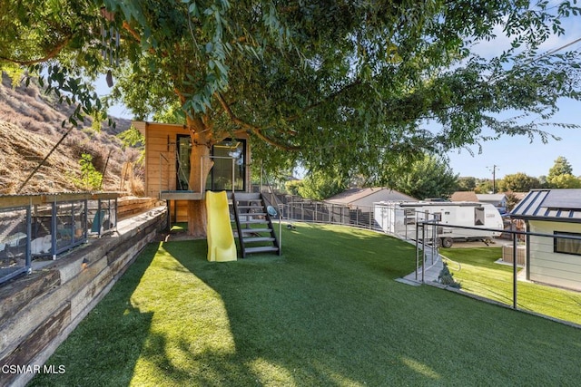 view of yard with a playground