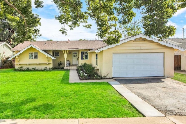 ranch-style home with a front yard and a garage