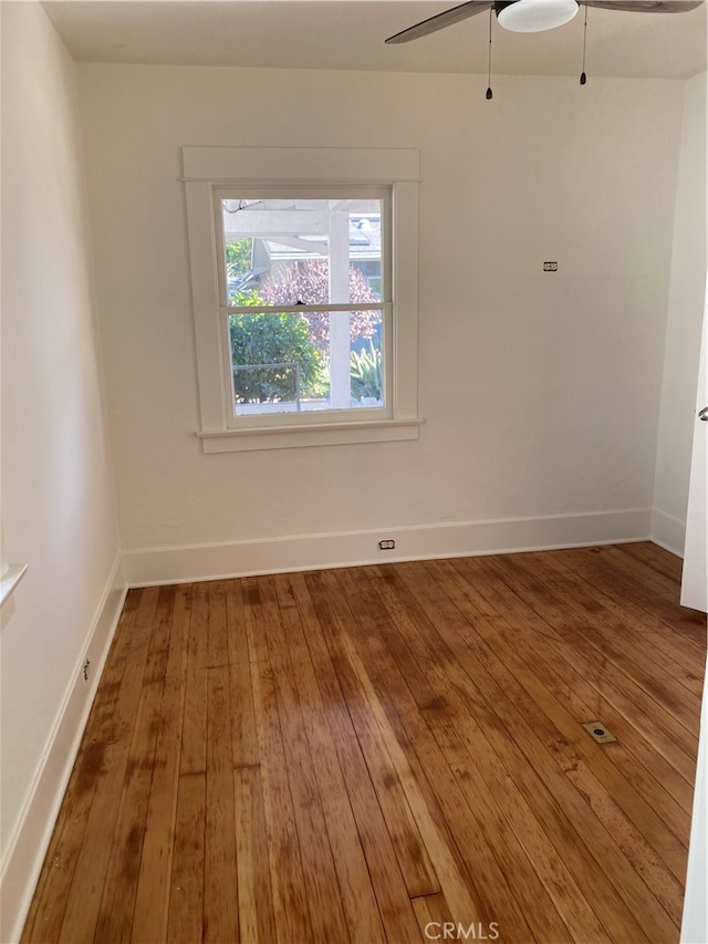 unfurnished room featuring wood-type flooring and ceiling fan