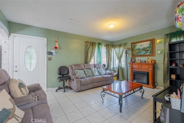 living room with a textured ceiling