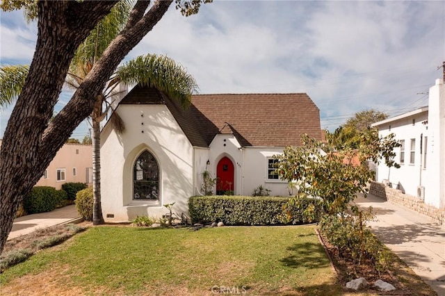 view of front of home with a front yard