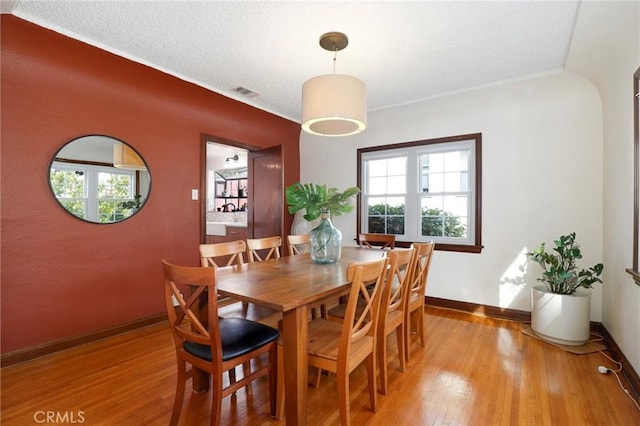 dining area featuring light hardwood / wood-style flooring