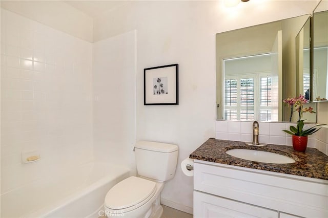 full bathroom featuring vanity, shower / bathtub combination, and toilet