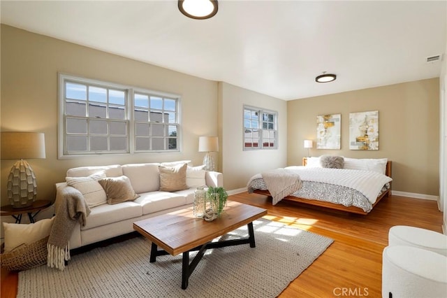 bedroom with hardwood / wood-style floors