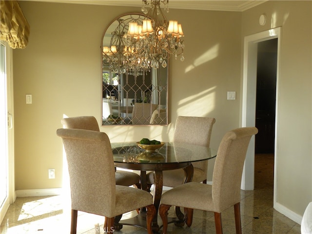 dining room with crown molding and an inviting chandelier