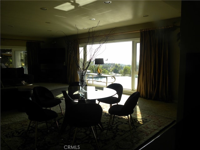 dining space with carpet floors