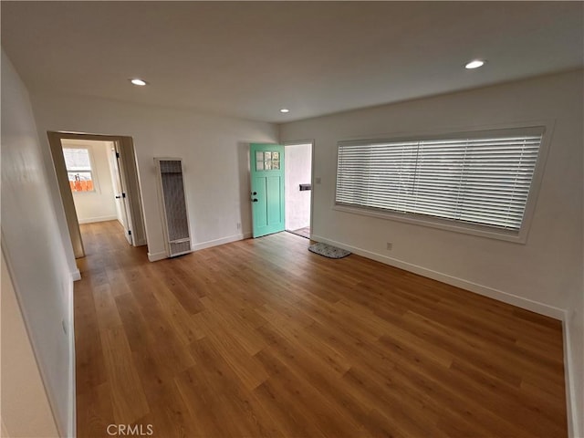 unfurnished room featuring wood-type flooring