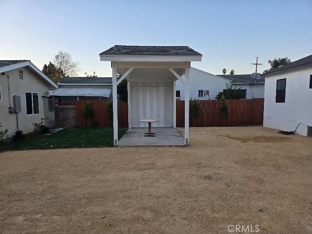 back of house with a yard