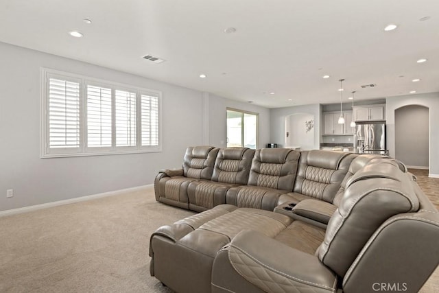 living room with light colored carpet