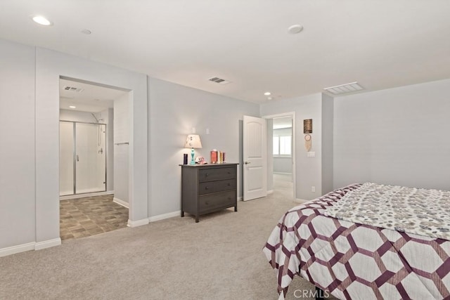 bedroom with light colored carpet