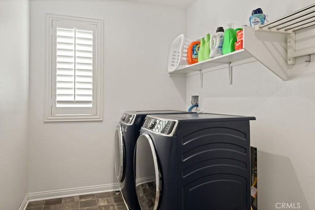 laundry room featuring separate washer and dryer