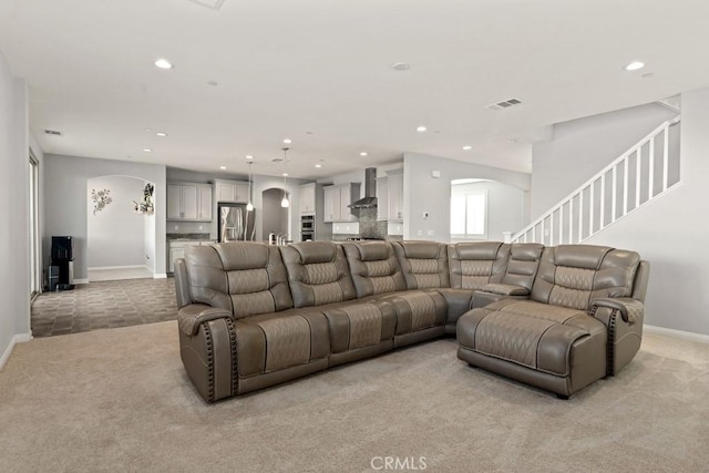 living room featuring light carpet