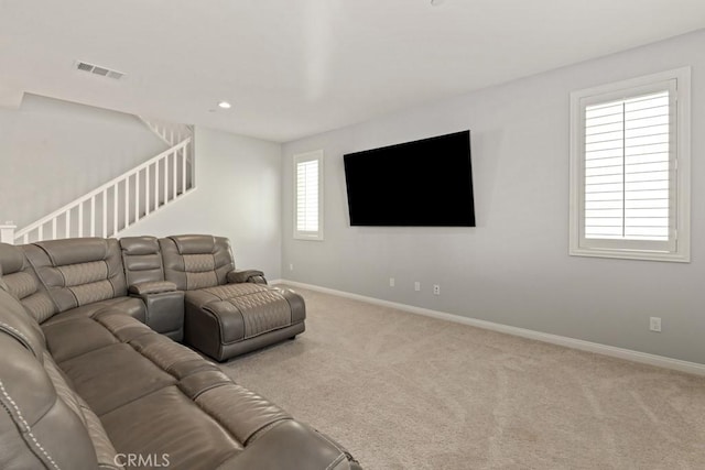 living room with light colored carpet