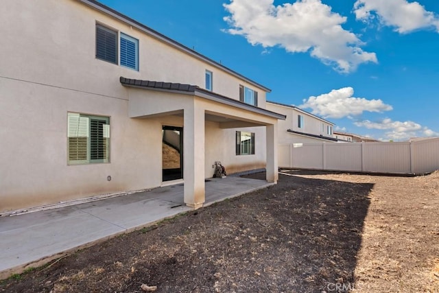 back of house featuring a patio