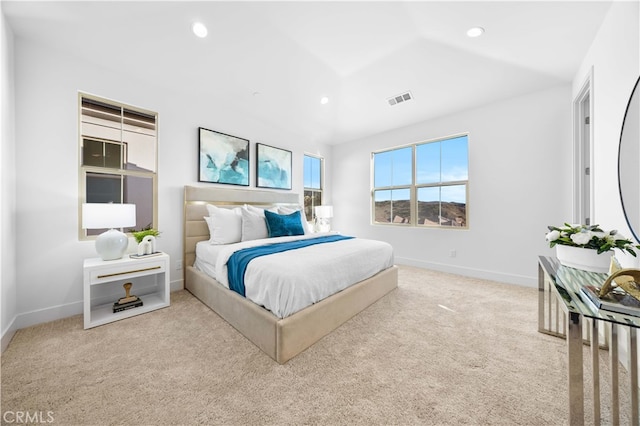 bedroom featuring light colored carpet