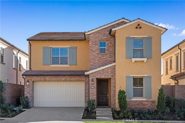 view of front of property with a garage