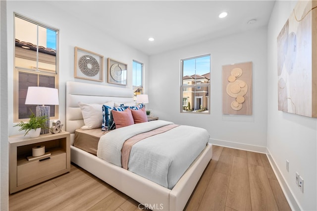 bedroom featuring light hardwood / wood-style flooring