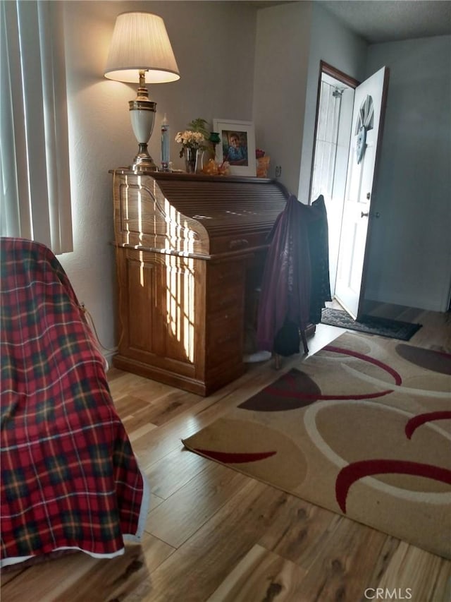 bedroom with wood finished floors