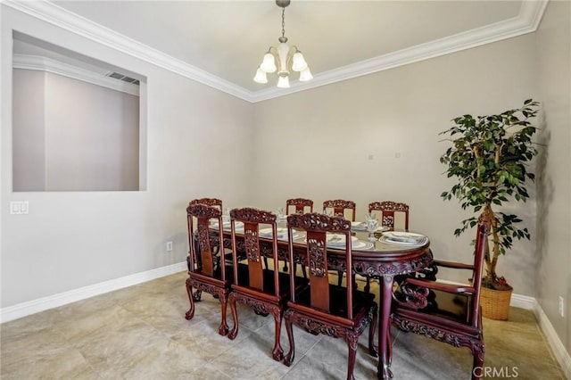 dining space featuring crown molding and a notable chandelier