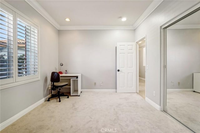 carpeted office space with crown molding