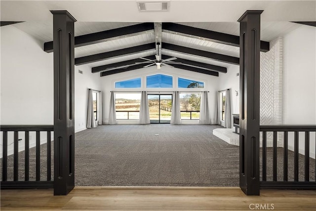 interior space featuring vaulted ceiling with beams, ceiling fan, and hardwood / wood-style floors