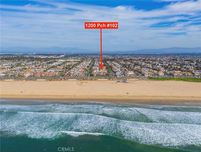 aerial view featuring a beach view and a water view