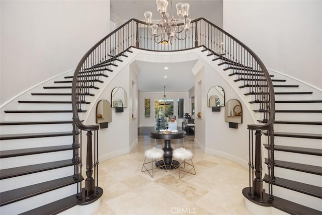 entryway with a chandelier