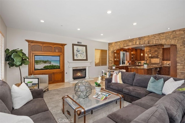 living room with light tile patterned floors