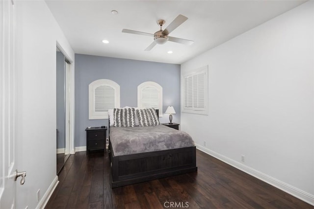 bedroom featuring ceiling fan and dark wood-type flooring