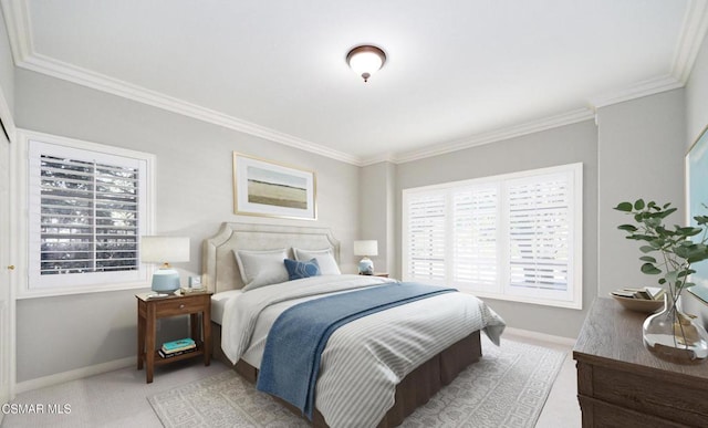 carpeted bedroom with ornamental molding