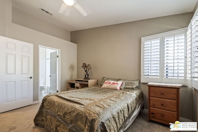 bedroom featuring carpet flooring, connected bathroom, and ceiling fan