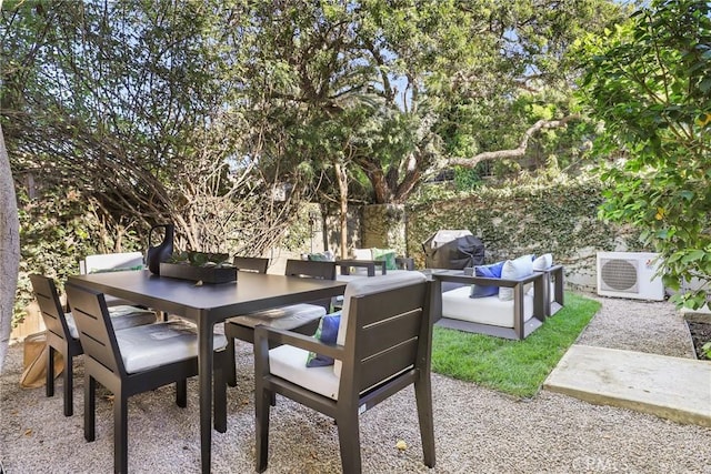 view of patio with ac unit and an outdoor hangout area