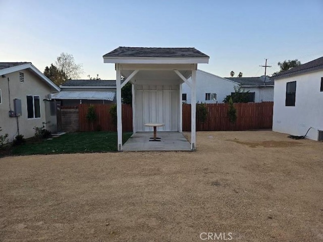 rear view of house with a yard