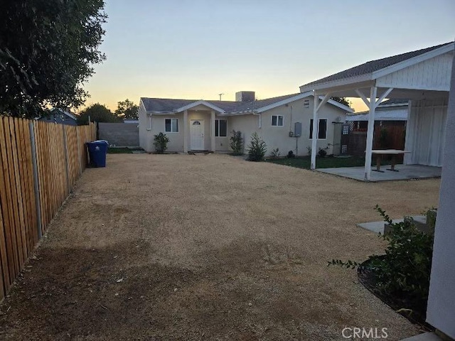 view of front of house with central AC unit