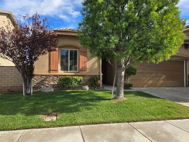 view of front facade with a front lawn and a garage