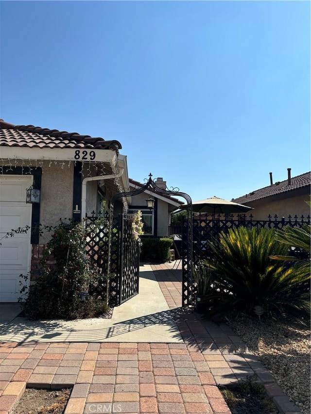 view of patio / terrace featuring a garage