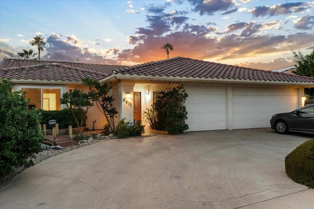 view of front of property with a garage