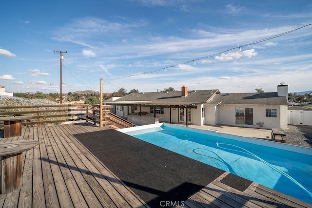 view of pool featuring a deck