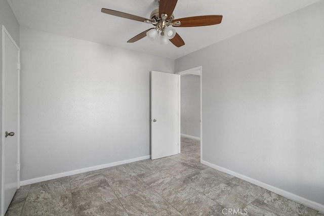 empty room featuring ceiling fan